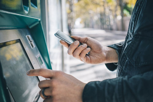 person using ATM